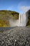 Beautiful Skogafoss. Amazing landscape at sunset in the most popular waterfall in Iceland.