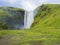 Beautiful Skogafoss waterfall in South Iceland Skogar with group