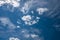 Beautiful sky background with fluffy and cirrus clouds