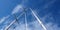 A beautiful sky cloudscape scene, over a yacht mast and rigging, with white Stratocumulus cloud in a light blue sky