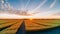 A beautiful sky landscape over a wheat field with a sunrise, created with the help of artificial intelligence