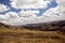 Beautiful sky over the wavy deforested landscape of northwest Madagascar