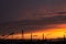 Beautiful sky at sunset with towering towers, lanterns, houses