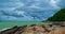 Beautiful skyclouds over the seabeach and big stone on beach at Khao Lam Ya, Rayong province Eastern of Thailand.