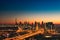 A beautiful Skyline view of Dubai, UAE as seen from Dubai Frame at sunset