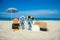 Beautiful slippers in the sand of the sea in Greece background