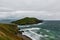 Beautiful sloping coast of the island during a severe storm