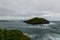 Beautiful sloping coast of the island during a severe storm