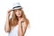 Beautiful slytish woman posing in fedora hat