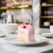 beautiful small pink cake on a marvel plot with modern kitchen background - ai generated