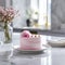 beautiful small pink cake on a marvel plot with modern kitchen background - ai generated