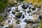 Beautiful small waterfall high in the mountains of North Ossetia