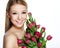 Beautiful smiling blonde woman with flowers