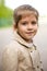 Beautiful smiling little girl in a coat