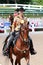 A Beautiful Smiling Senior Citizen Rides A Horse At The Germantown Charity Horse Show