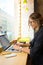 Beautiful smiling woman confident government worker having online video conference on laptop computer