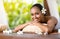 Beautiful smiling woman relaxing after massage