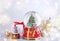 Beautiful snow globes and Christmas decor on light background. Bokeh effect