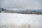 Beautiful snow landscape background with meadow and forest during cloudy day in the winter, Neunkircher Hoehe Odenwald, Darmstadt