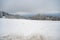 Beautiful snow landscape background with meadow and forest during cloudy day in the winter, Neunkircher Hoehe Odenwald, Darmstadt