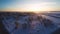 Beautiful snow landscape. Winter trees. Sunset. Aerial footage. Flying around.