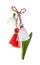 Beautiful snowdrop with traditional martisor on white background. Symbol of first spring day