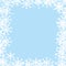 Beautiful snowflakes frame on a blue winter christmas marketing vector background.