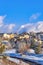 Beautiful snowy neighborhood in Highland Utah with blue sky and mountain views