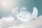 Beautiful Soft and Light Fluffy White Feathers Floating inThe Sky with Clouds. Abstract. Heavenly dreamy fluffy colorful sky.