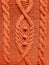 Beautiful soft orange knitted surface texture