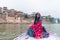 Beautiful south east asian girl in traditional Indian sari/saree on boat at Varanasi, India