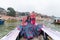 Beautiful south east asian girl in traditional Indian sari/saree on boat at Varanasi, India