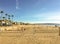 Beautiful Southern California scenery with beach volleyball going to the horizon under sunny blue sky