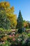 Beautiful spa garden Rottach-Egern with bench and autumnal flowers