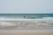 Beautiful spanish coastline: Woman silhouette bathing, Beach, Sea, Waves with white crest