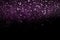 Beautiful, sparkling purple glitter pouring down from above on a dark background