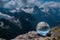 Beautiful spherical glass ball with majestic Caucasian mountains