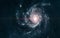 A beautiful spiral galaxy in red tones somewhere in deep space. Science fiction
