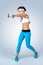 Beautiful sport fitness woman doing workout exercise with d