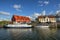 Beautiful sport yachts, tourist ferries and ships on Dane river, Klaipeda, Lithuania. Summer view on Dane river