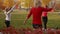 Beautiful sportive women dancing together in park