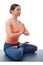 Beautiful sporty fit yogini woman meditates in