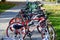 Beautiful sporty mountain multicolored bicycles for recreation and sport are parked in a row. Belarus, Minsk, September 12, 2018