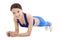 Beautiful sporty woman doing core exercise on the floor