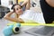 Beautiful sporty woman doing press fitness exercise at home