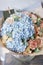 Beautiful spring bouquet. flower arrangement with hydrangea. Color light blue. The concept of a flower shop, a small