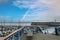 a beautiful spring landscape at Fisherman\\\'s Wharf on Pier 39 with boats and yachts docked in the harbor with ocean water