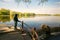 Beautiful spring landscape, a teenager stands on the shore of a lake.