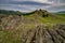 Beautiful spring lanscape with rocks, trees and clouds