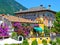 Beautiful spring view of Limone sul Garda, buildings in flowers. Limone sul Garda, famous region of Lombardy, Italy